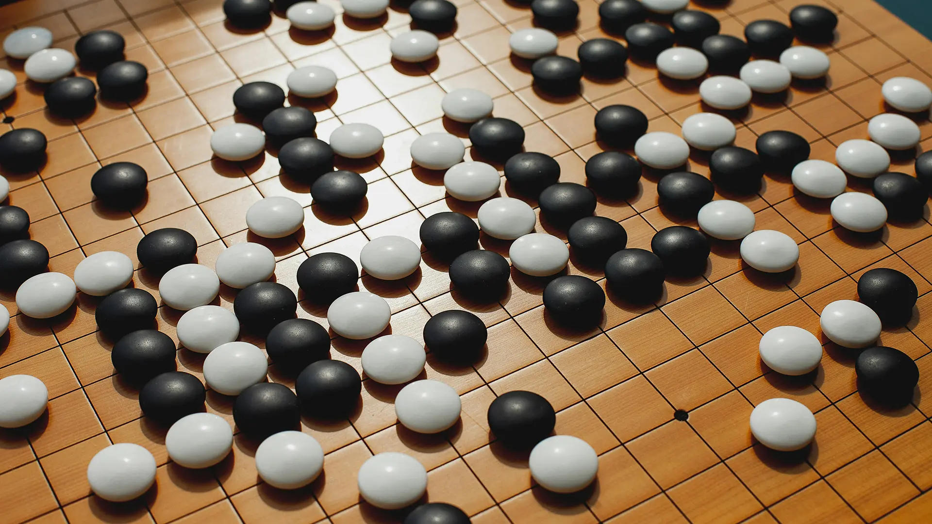 'Go' strategy board game in play