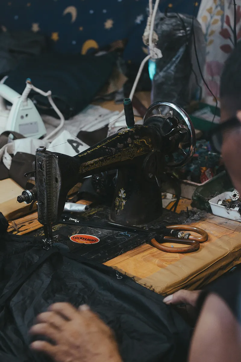 Close up of sewing machine in sweat shop