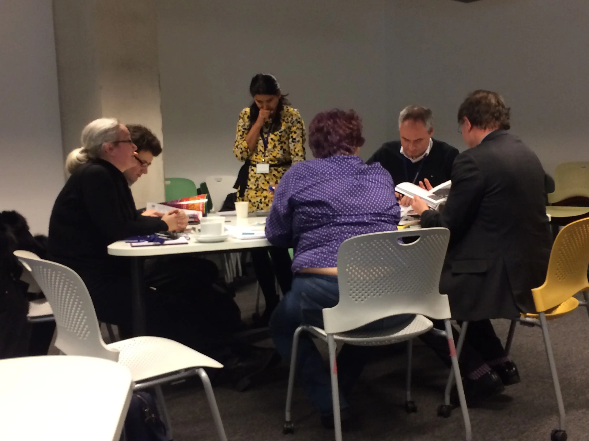 People engaged in a brand definition workshop